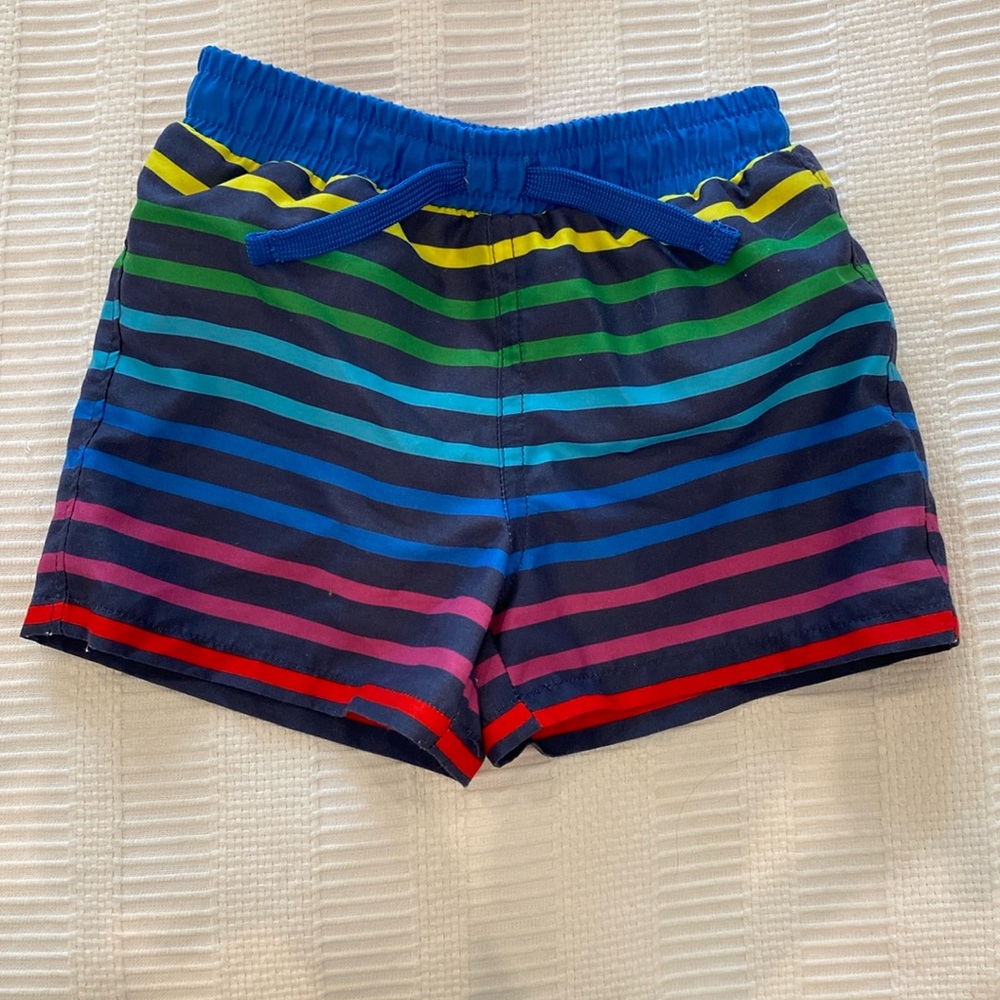 Primary baby swim trunk in navy rainbow stripe 6-12 months